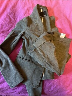 Grey Banana Republic stretch suit, jacket size 0, pants size 2.